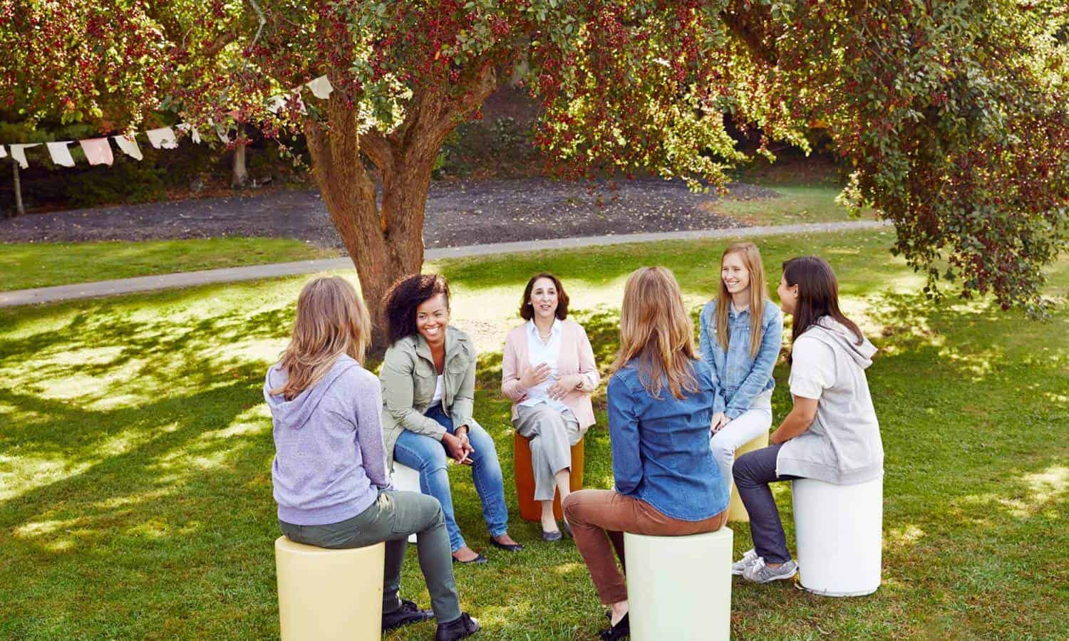 Women talking outside- clinical services in addiction treatment group counseling