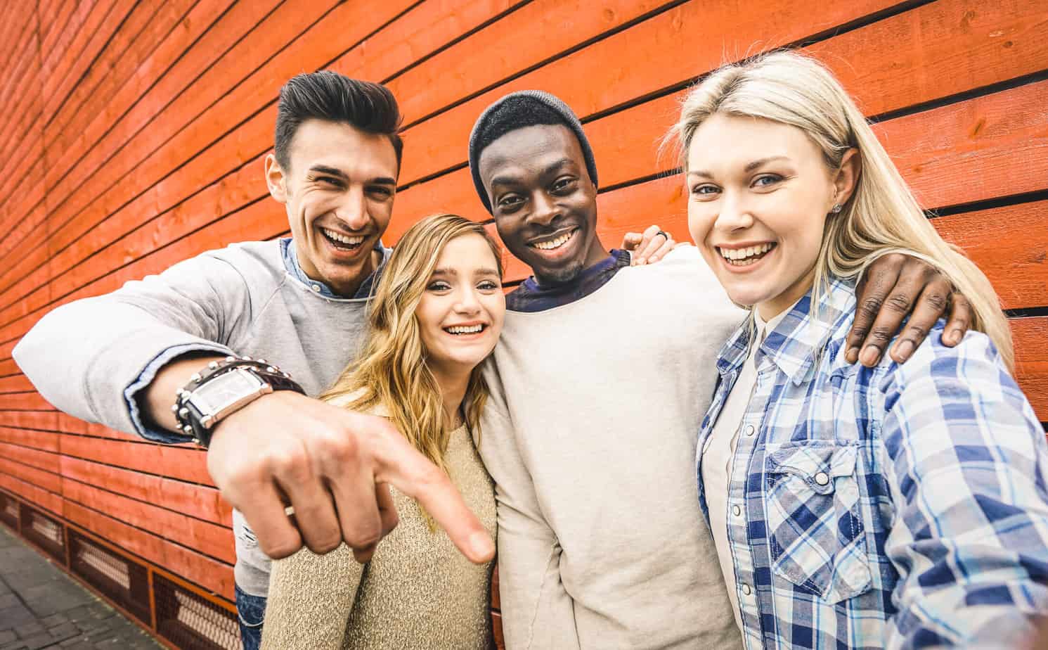 group of people in addiction recovery under an umbrella. 