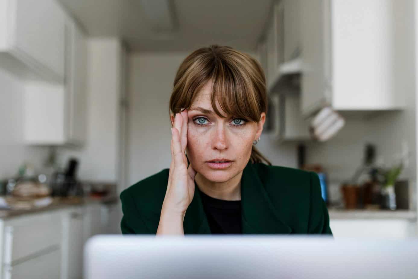 Stressed out woman working at home during coronavirus pandemic