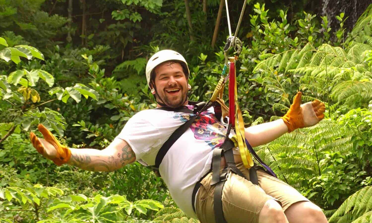 Man on zip line at Mountainside Treatment Center Alumni 2017 Costa Rica trip