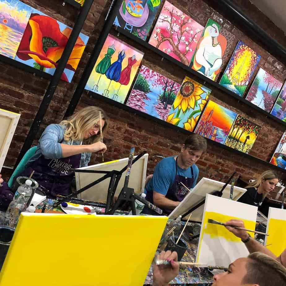 Man and women at Mountainside Treatment Center Alumni Paint Night Event in NYC