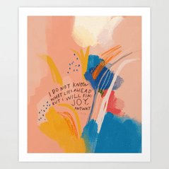 inspirational quote written over watercolor and framed