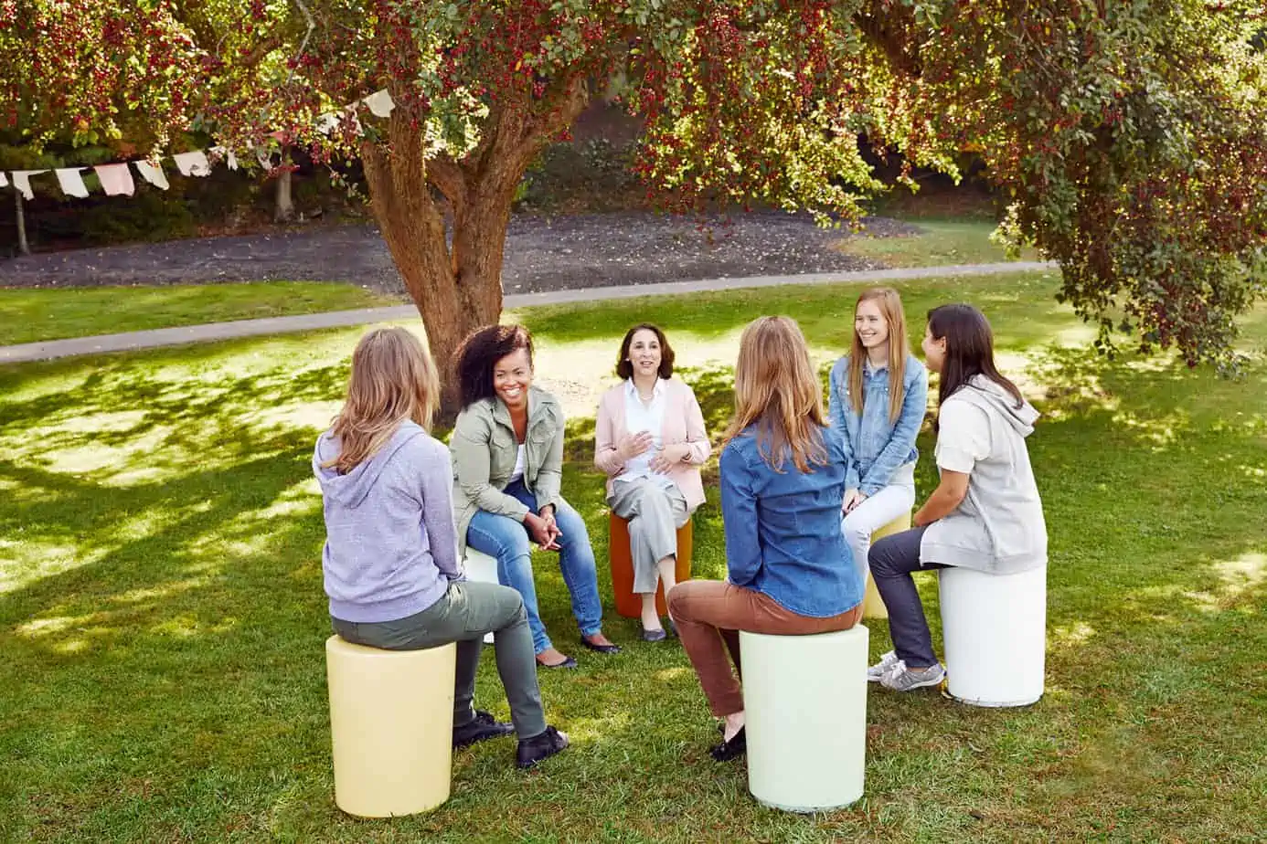 Women talking outside- addiction treatment group counseling