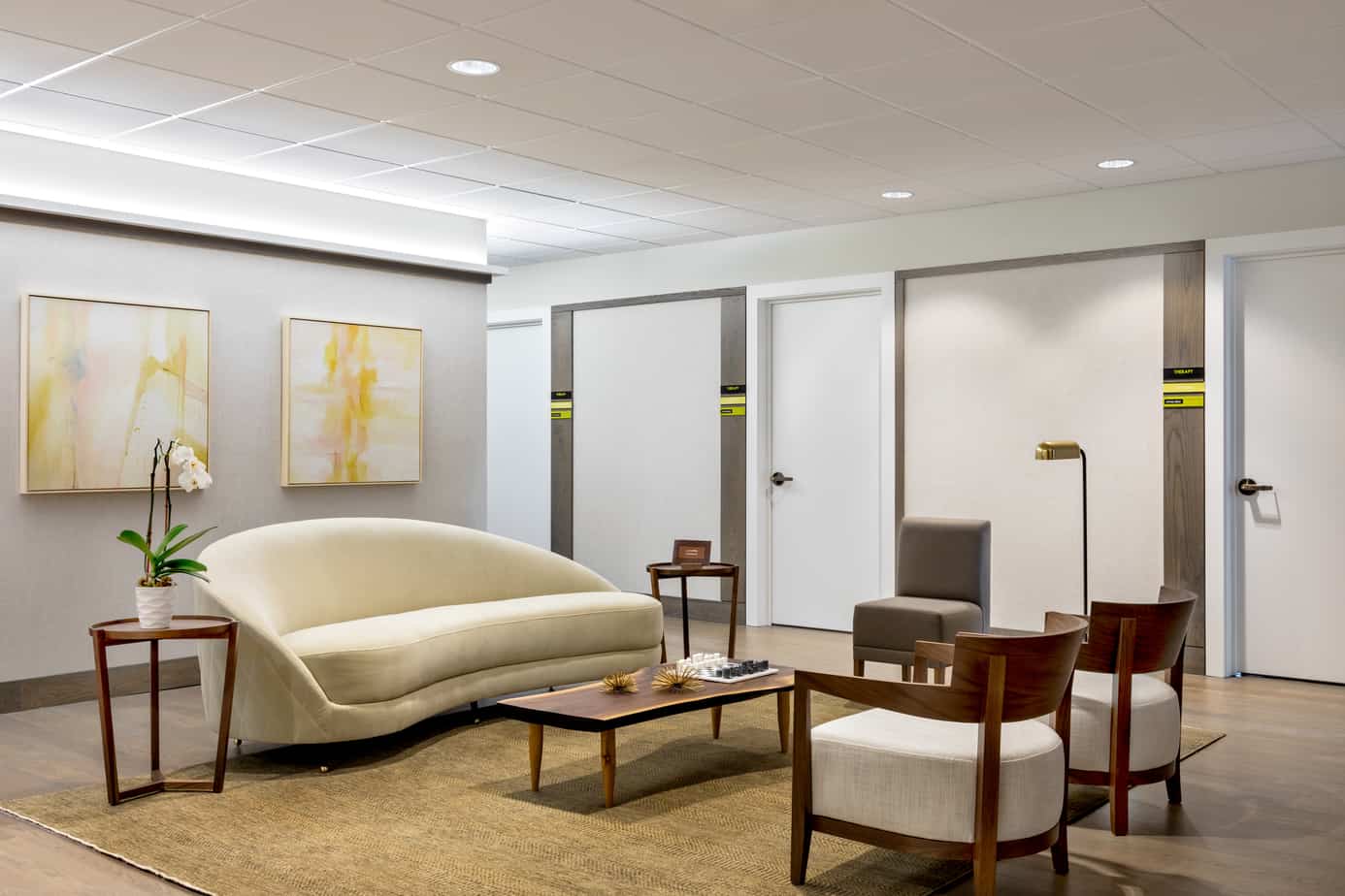 Light bright reception area with modern furniture at Mountainside treatment center in Chappaqua.