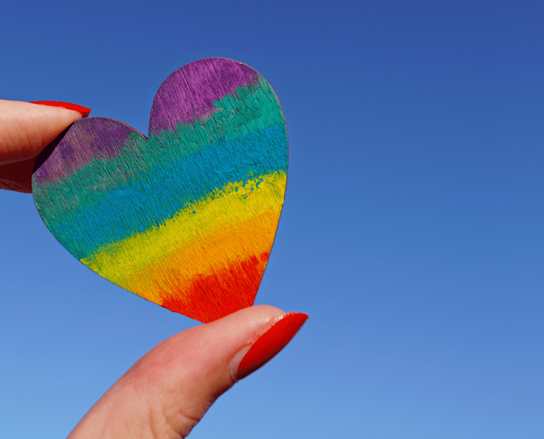 A rainbow heart representing LGBTQ addiction treatment needs.