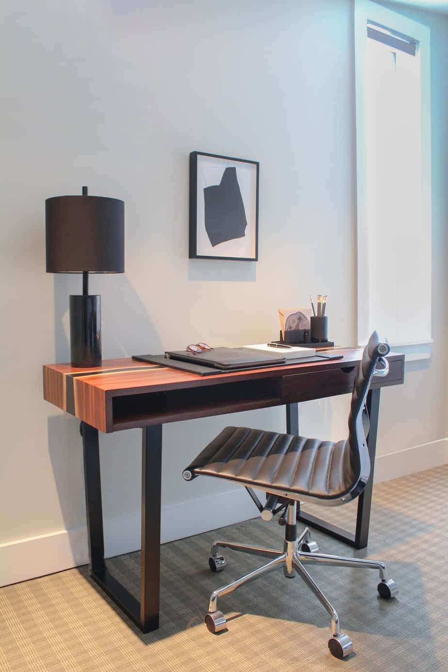 Designated work space with desk in bespoke suite for clients in addiction treatment who cannot take time away from work.