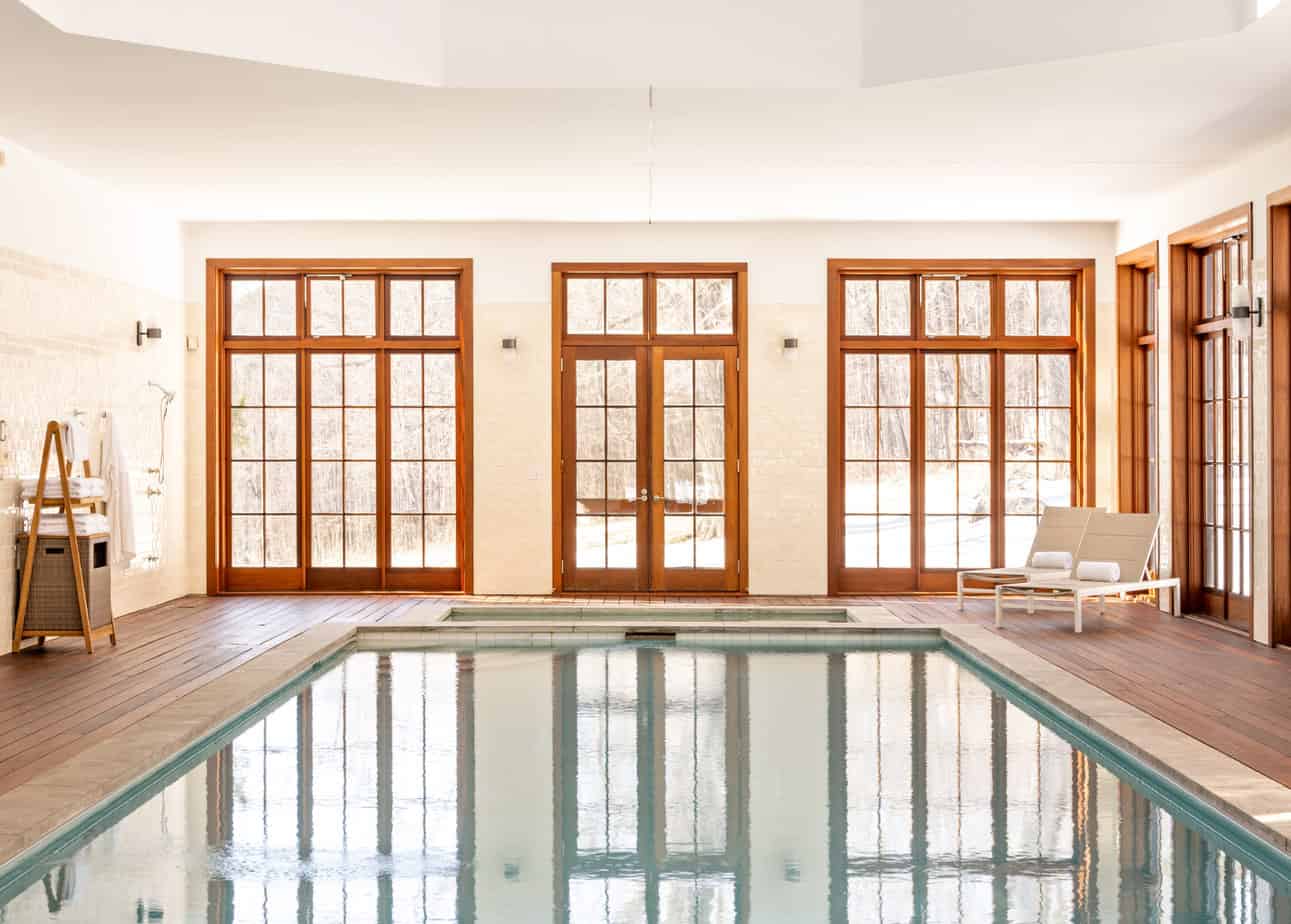 Large indoor pool with lots of natural light at sober living house in Connecticut