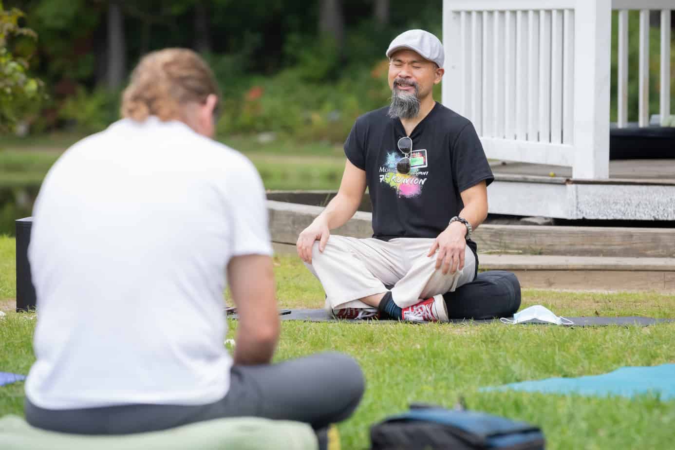 A meditation instructor on the lawn at Mountainside treatment center in CT