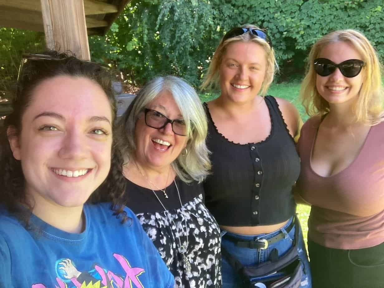 4 women smiling at Mountainside Treatment Center Alumni Lake Compounce Event 2022