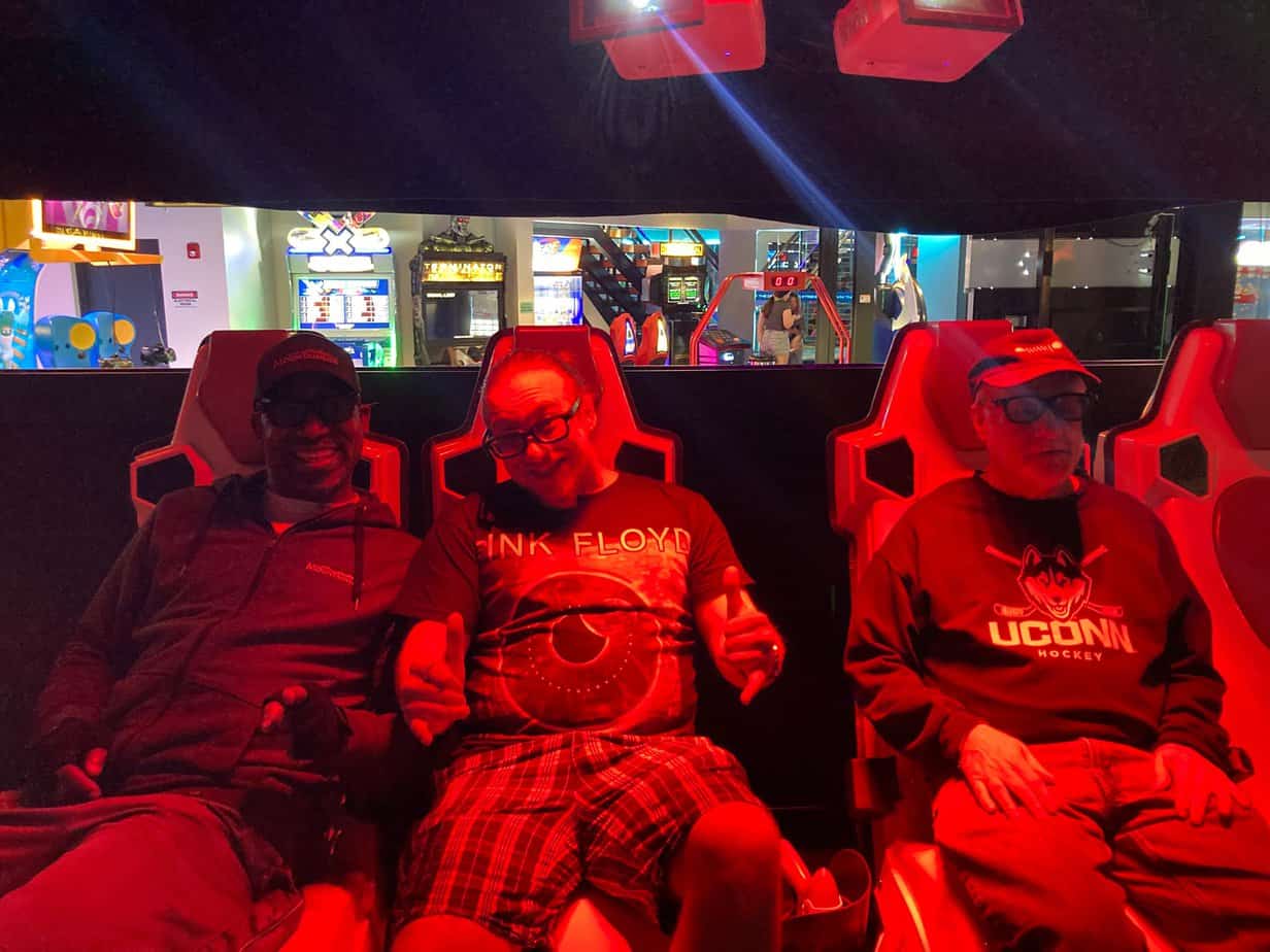 Mountainside Treatment Center Alumni smiling on VR ride at Xtreme Play 2022 in Danbury
