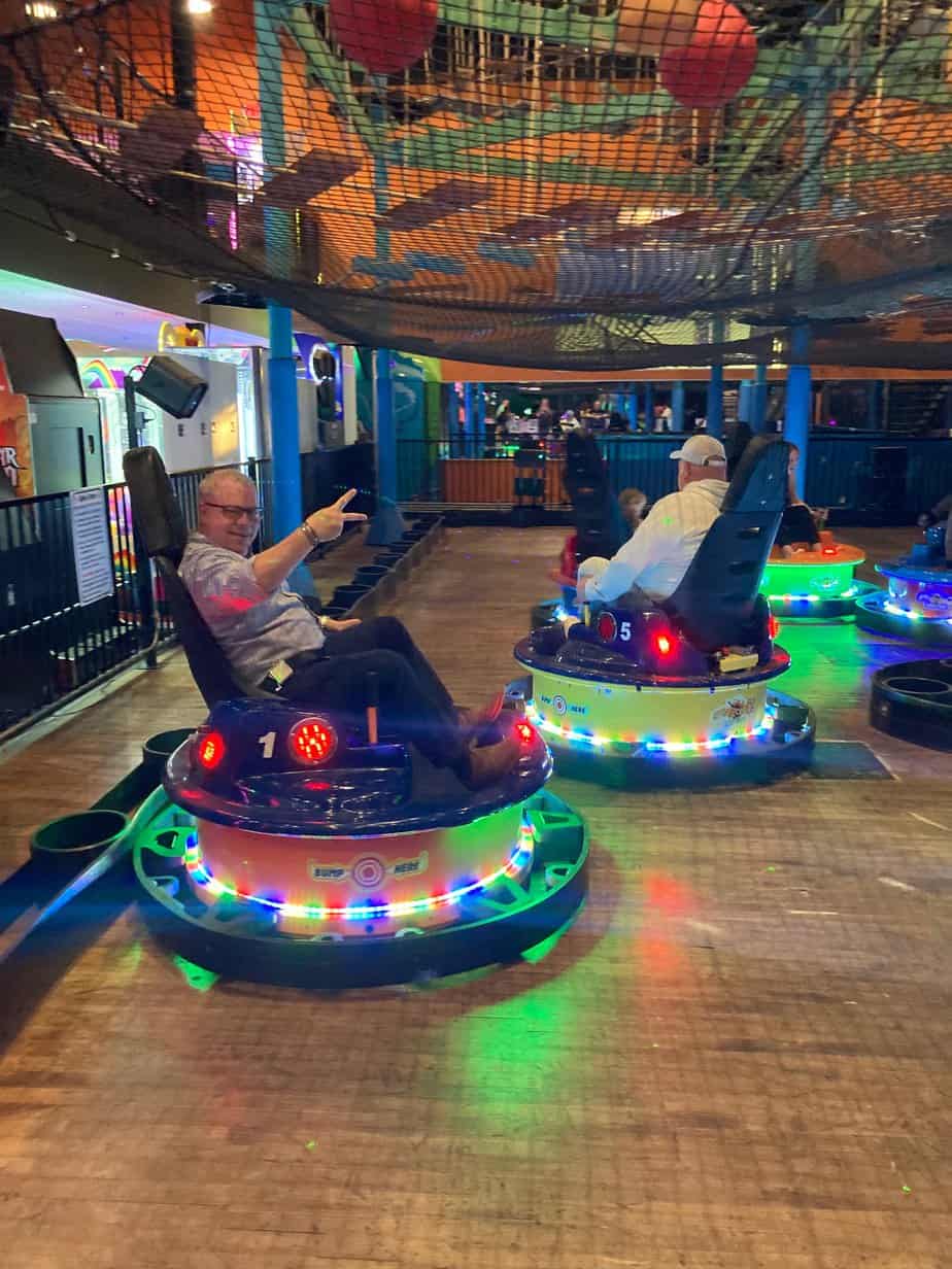 Mountainside Treatment Center Alumni riding on bumper cars at Xtreme Play 2022 in Danbury