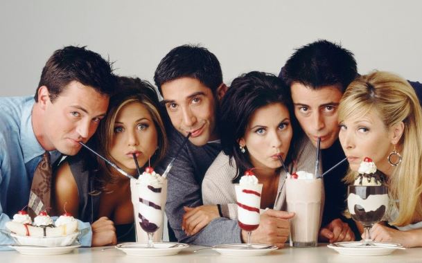 cast of friends sharing milkshakes