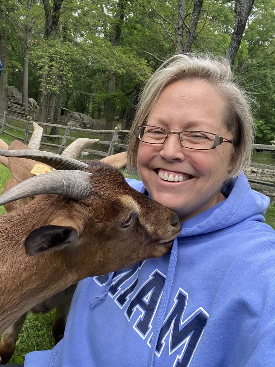 gaylen m alumni with goat