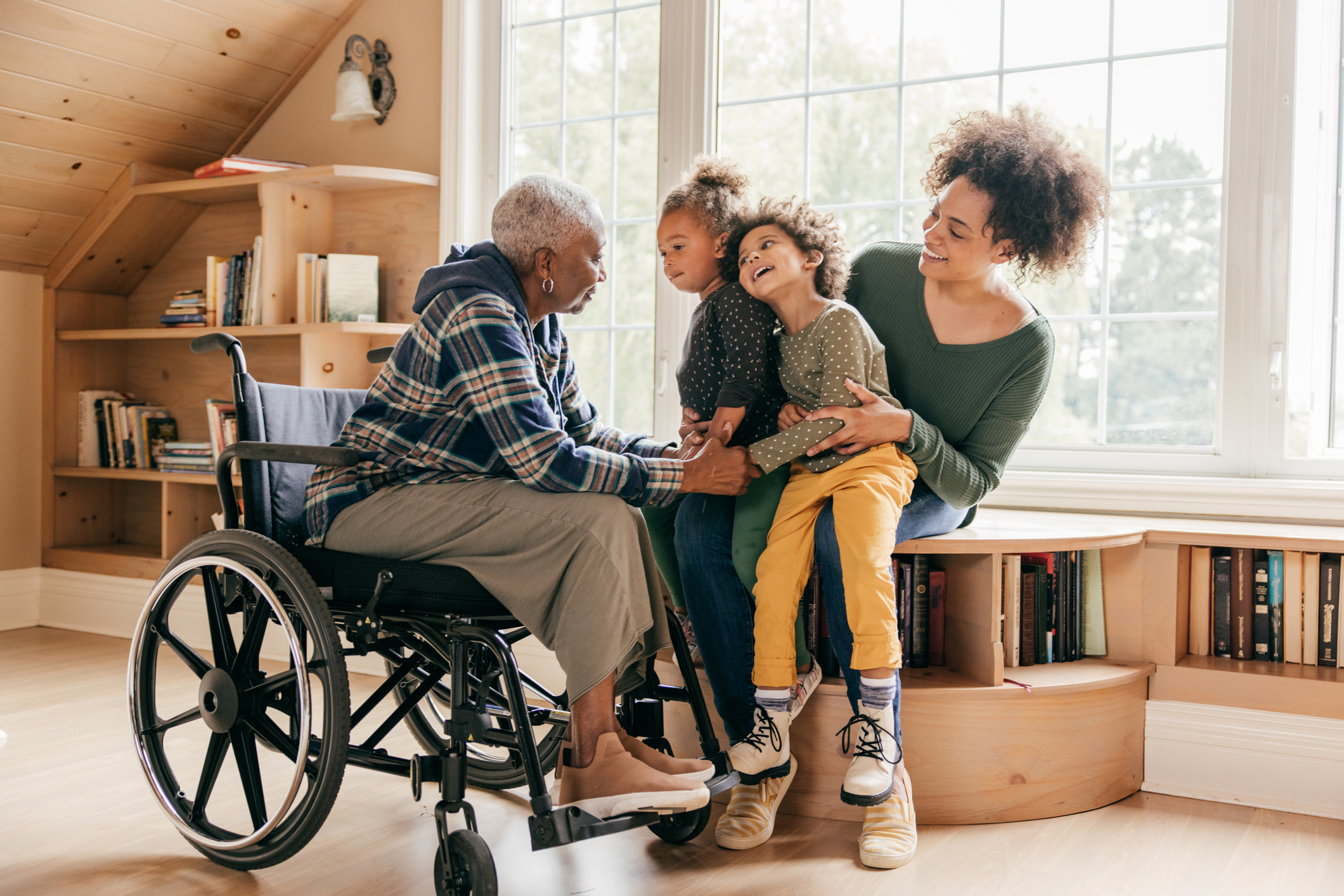 grandmother of family impacted by intergenerational trauma shares stories with her grandchildren and child.